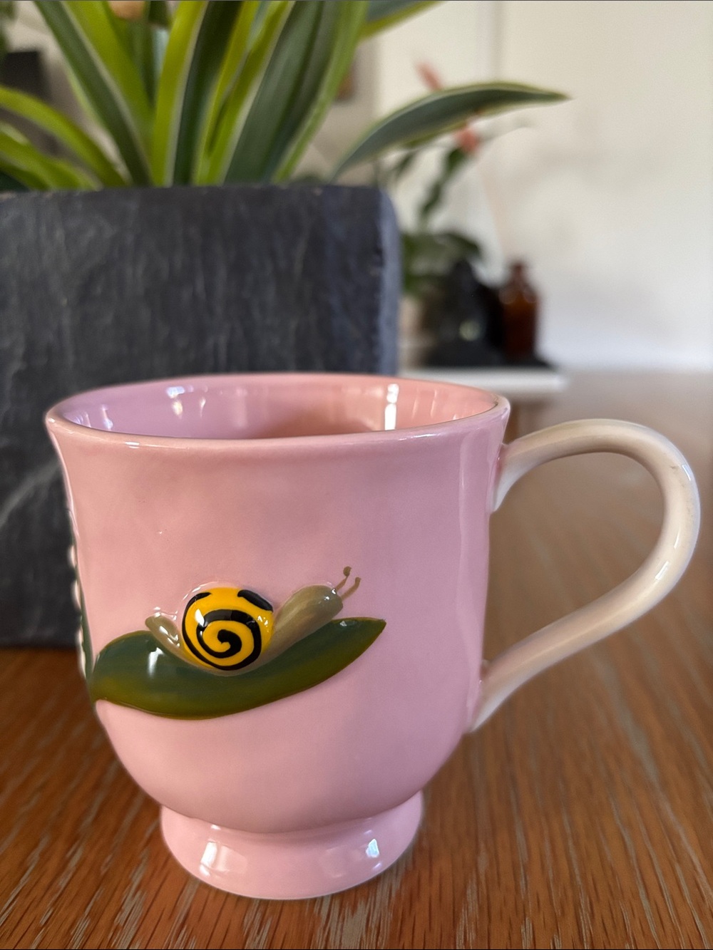 Anthropologie Faye Pink Ceramic Mug with Green Leaf and Yellow Snail Accent
